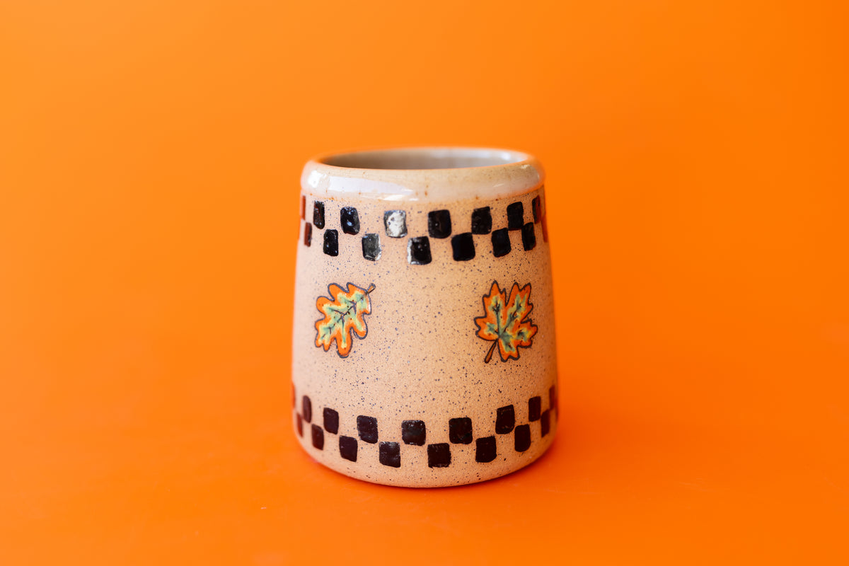 CHECKS & LEAVES CUP