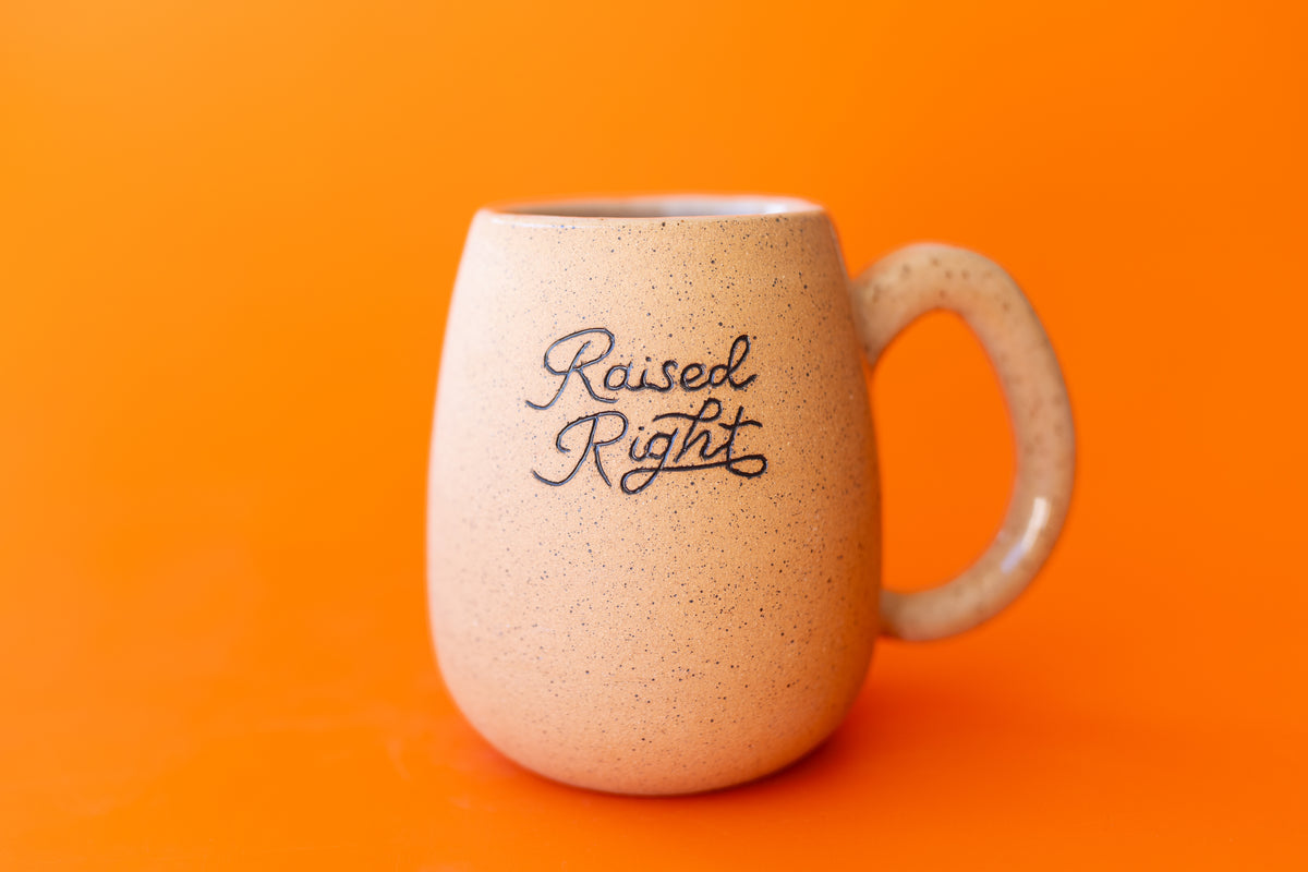 RAISED RIGHT MUG