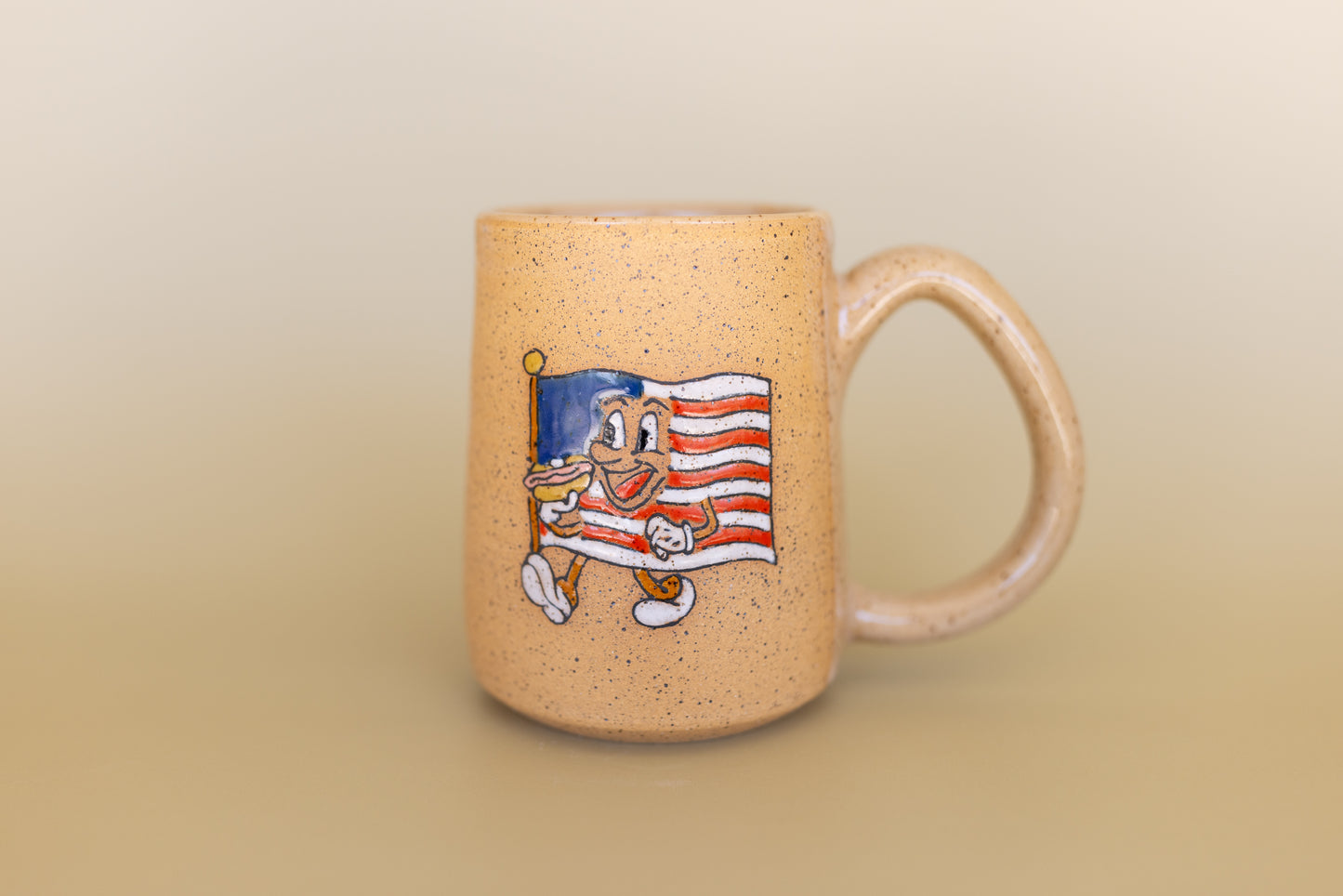 MUG 31/75 FLAG EATING HOT DOG